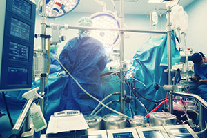 Surgeon Team in an operation room during a surgery.